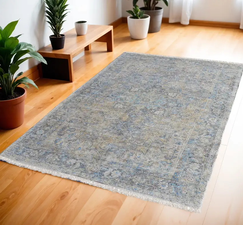 Gray Blue and Tan Abstract Hand Woven Distressed Area Rug With Fringe Photo 1