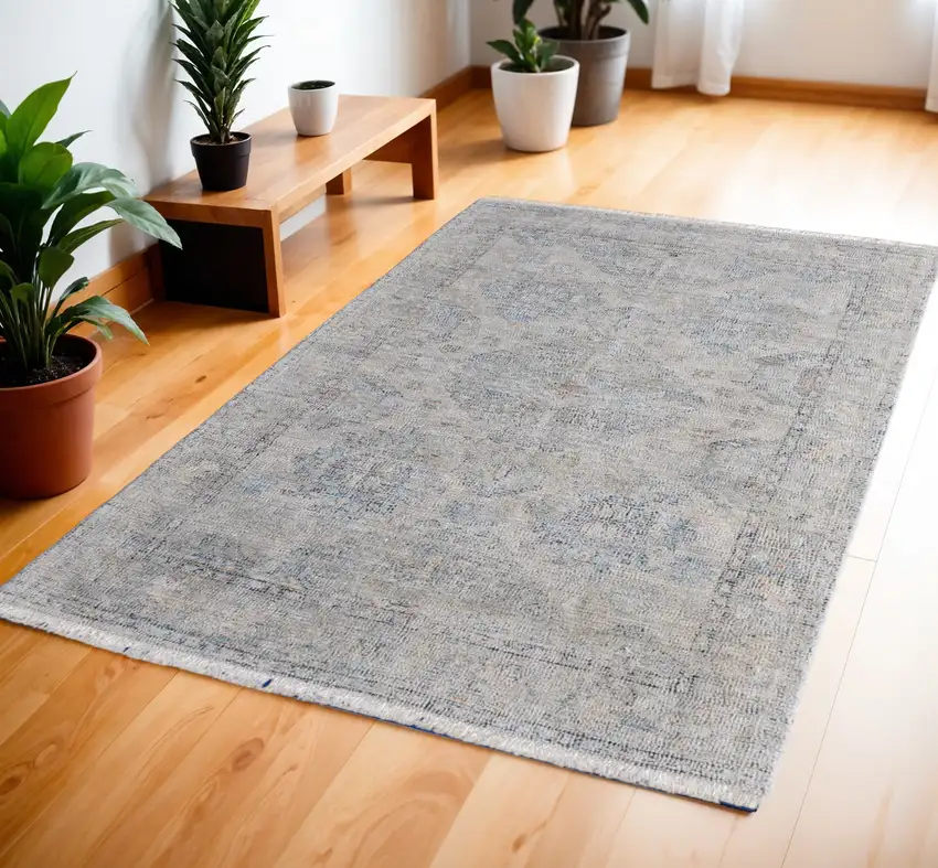 Gray Blue and Taupe Abstract Hand Woven Distressed Area Rug With Fringe Photo 1