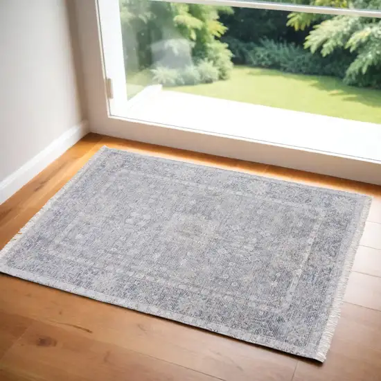 Gray Blue and Taupe Abstract Hand Woven Distressed Area Rug With Fringe Photo 1