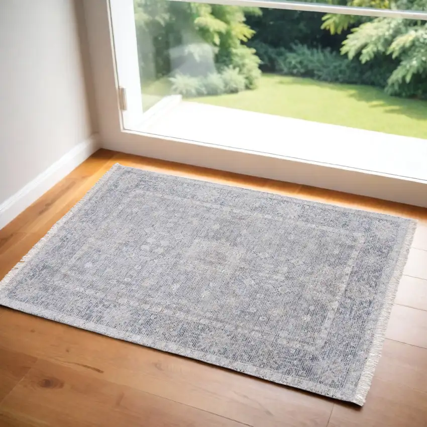 Gray Blue and Taupe Abstract Hand Woven Distressed Area Rug With Fringe Photo 1