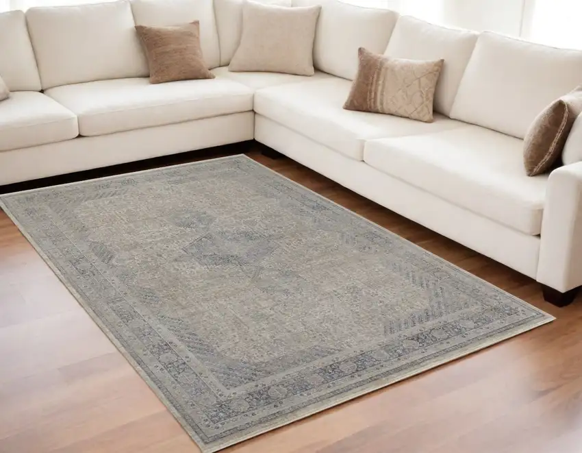 Gray Blue and Taupe Oriental Power Loom Worn Faded Area Rug With Fringe Photo 1