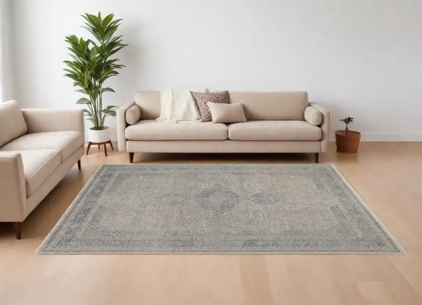 Gray Blue and Taupe Oriental Power Loom Worn Faded Area Rug With Fringe Photo 1