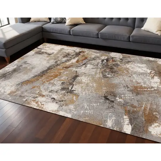 Gray Brown And Beige Abstract Area Rug Photo 1