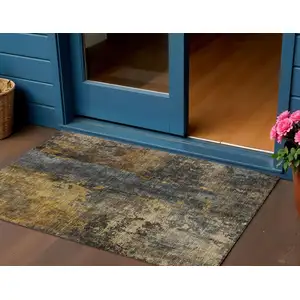 Photo of Gray Brown And Gold Abstract Washable Indoor Outdoor Area Rug