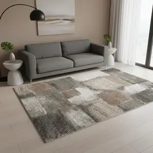 Photo of Gray Brown And Ivory Abstract Area Rug
