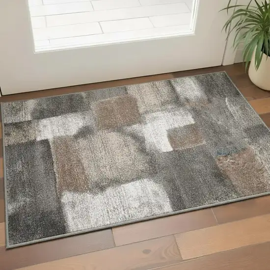 Gray Brown And Ivory Abstract Area Rug Photo 1