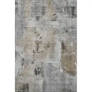 Photo of Gray Brown And Ivory Abstract Washable Area Rug With UV Protection