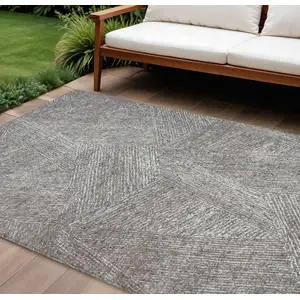 Photo of Gray Brown And Ivory Abstract Washable Indoor Outdoor Area Rug
