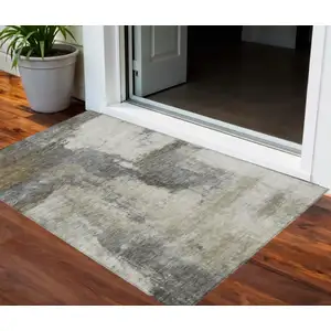 Photo of Gray Brown And Ivory Abstract Washable Indoor Outdoor Area Rug