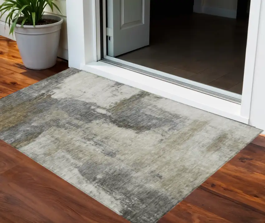 Gray Brown And Ivory Abstract Washable Indoor Outdoor Area Rug Photo 1