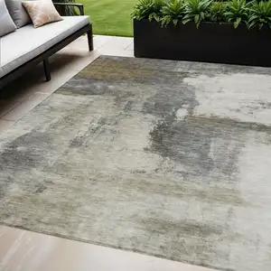 Photo of Gray Brown And Ivory Abstract Washable Indoor Outdoor Area Rug