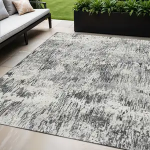 Photo of Gray Brown And Ivory Abstract Washable Indoor Outdoor Area Rug