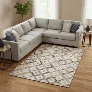 Photo of Gray Brown And Ivory Geometric Washable Area Rug With UV Protection