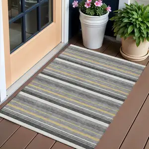 Photo of Gray Brown And Ivory Striped Washable Indoor Outdoor Area Rug