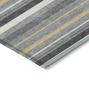 Photo of Gray Brown And Ivory Striped Washable Indoor Outdoor Area Rug