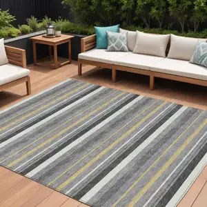 Photo of Gray Brown And Ivory Striped Washable Indoor Outdoor Area Rug