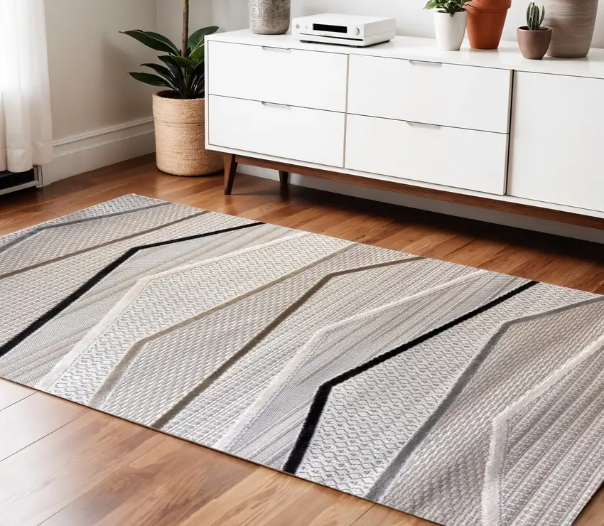 Gray Brown and Beige Abstract Area Rug Photo 1
