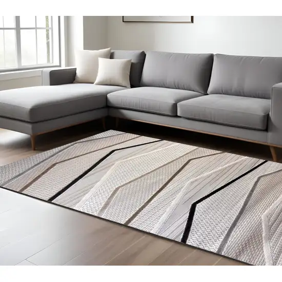 Gray Brown and Beige Abstract Area Rug Photo 1