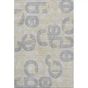 Photo of Gray Charcoal And Gold Geometric Washable Area Rug With UV Protection