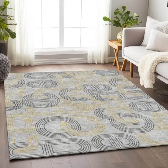 Gray Charcoal And Gold Geometric Washable Area Rug With UV Protection Photo 4