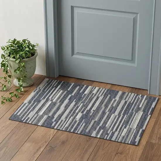 Gray Charcoal And Ivory Abstract Washable Area Rug With UV Protection Photo 1