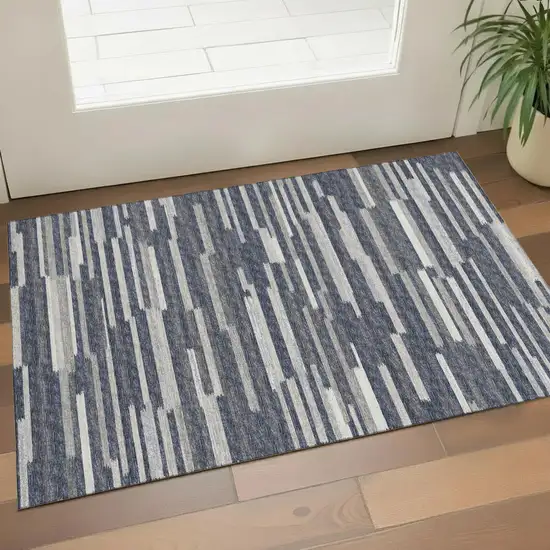 Gray Charcoal And Ivory Abstract Washable Area Rug With UV Protection Photo 1