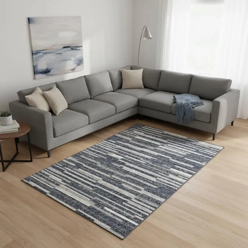 Gray Charcoal And Ivory Abstract Washable Area Rug With UV Protection Photo 1