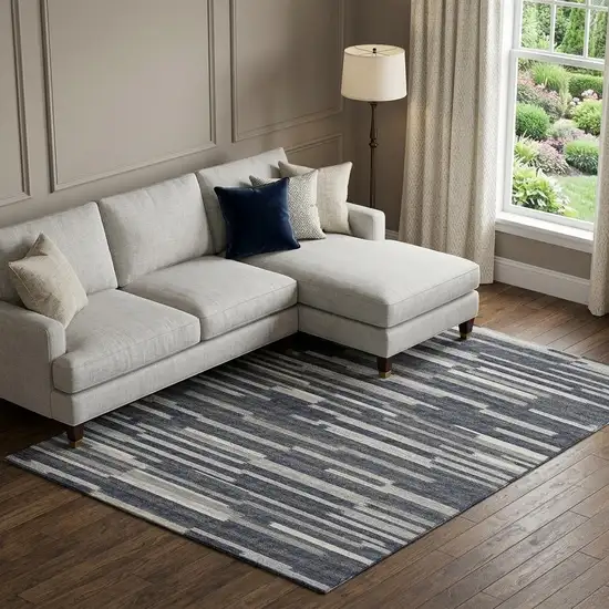 Gray Charcoal And Ivory Abstract Washable Area Rug With UV Protection Photo 1