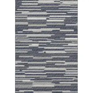 Photo of Gray Charcoal And Ivory Abstract Washable Area Rug With UV Protection