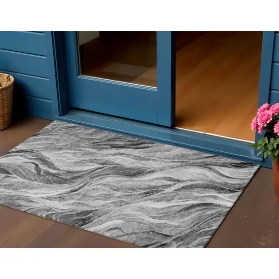 Gray Charcoal And Ivory Abstract Washable Indoor Outdoor Area Rug Photo 1