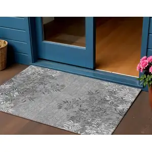 Photo of Gray Charcoal And Ivory Floral Washable Indoor Outdoor Area Rug