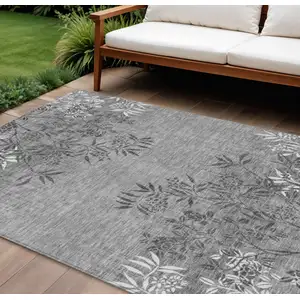 Photo of Gray Charcoal And Ivory Floral Washable Indoor Outdoor Area Rug