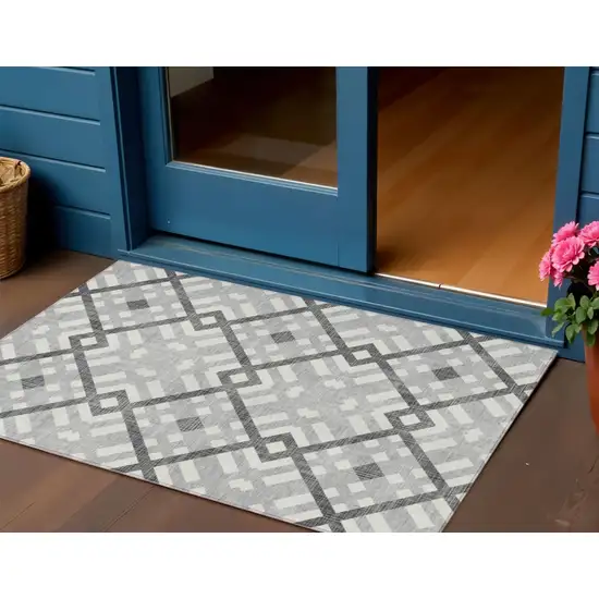 Gray Charcoal And Ivory Geometric Washable Indoor Outdoor Area Rug Photo 1