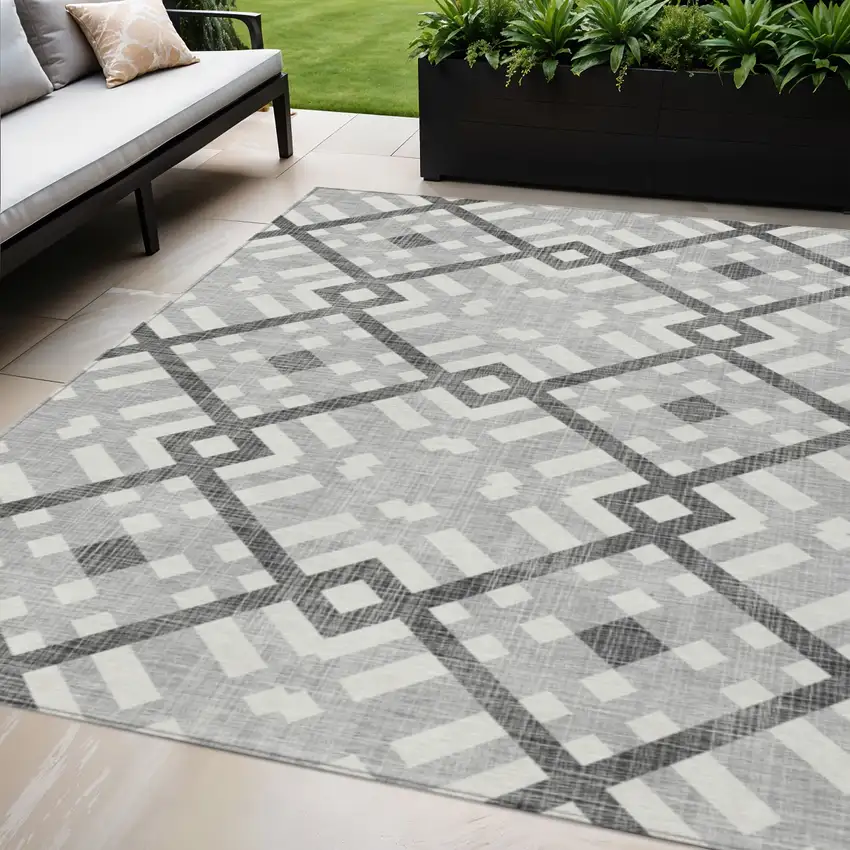 Gray Charcoal And Ivory Geometric Washable Indoor Outdoor Area Rug Photo 1