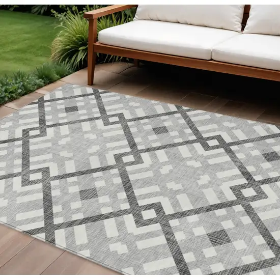 Gray Charcoal And Ivory Geometric Washable Indoor Outdoor Area Rug Photo 1