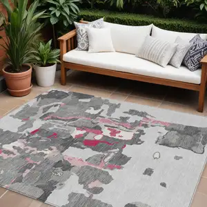 Photo of Gray Charcoal And Pink Abstract Washable Indoor Outdoor Area Rug