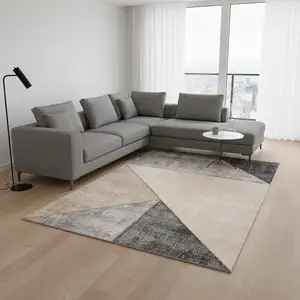 Photo of Gray Cream And Beige Geometric Area Rug