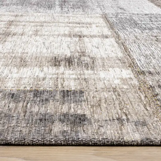 Gray Cream And Tan Abstract Area Rug Photo 9