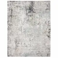 Photo of Gray Cream And Taupe Abstract Distressed Stain Resistant Area Rug
