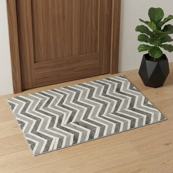 Gray And Ivory Chevron Distressed Area Rug Photo 1
