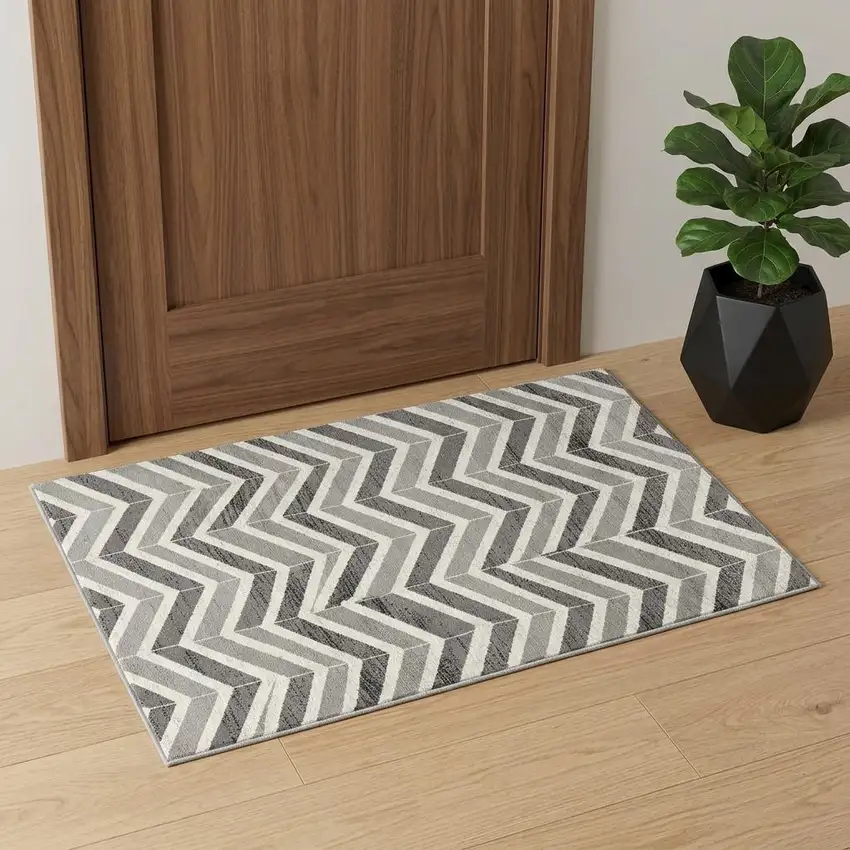 Gray And Ivory Chevron Distressed Area Rug Photo 1