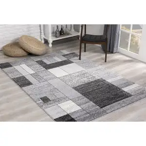 Photo of Gray Distressed Geometric Area Rug