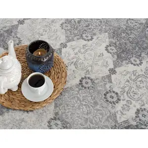 Photo of Gray Distressed Trellis Pattern Area Rug