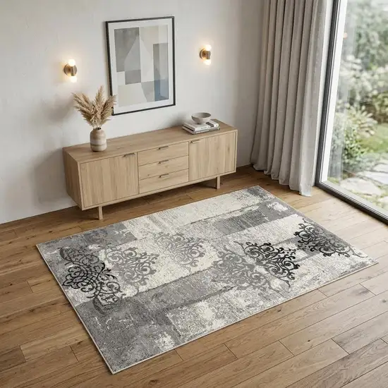 Gray And Ivory Damask Distressed Area Rug Photo 1