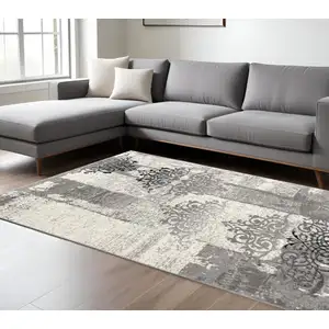 Photo of Gray Faded Filigree Pattern Area Rug