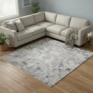 Photo of Gray Floral Distressed Area Rug