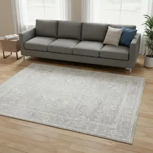 Photo of Gray Floral Distressed Area Rug