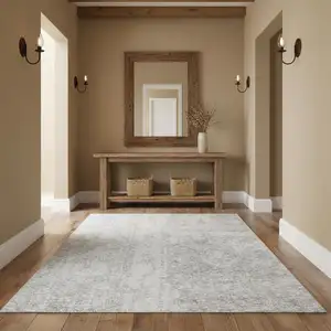 Photo of Gray Floral Power Loom Worn Faded Area Rug