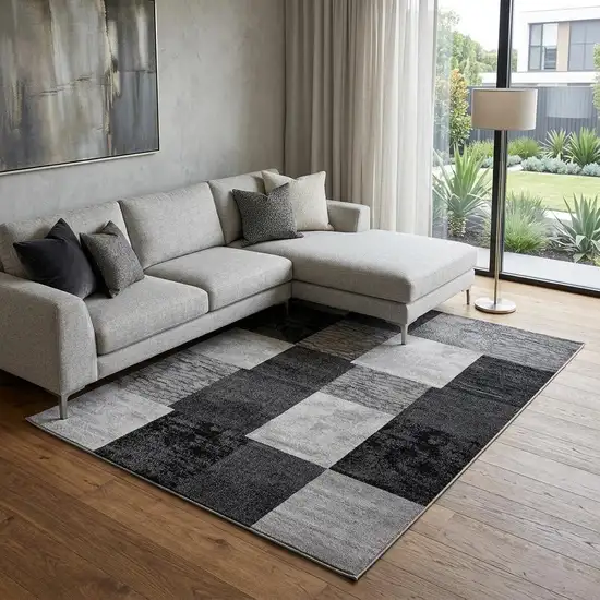 Black And Gray Geometric Distressed Area Rug Photo 1