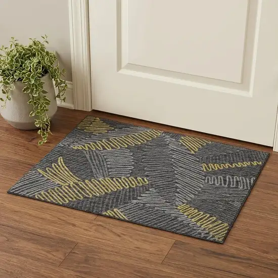 Gray Gold And Black Botanical Leaves Washable Area Rug With UV Protection Photo 1